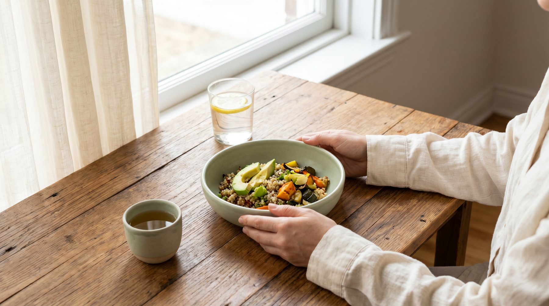 A calm lunch at a warm wooden table by the window